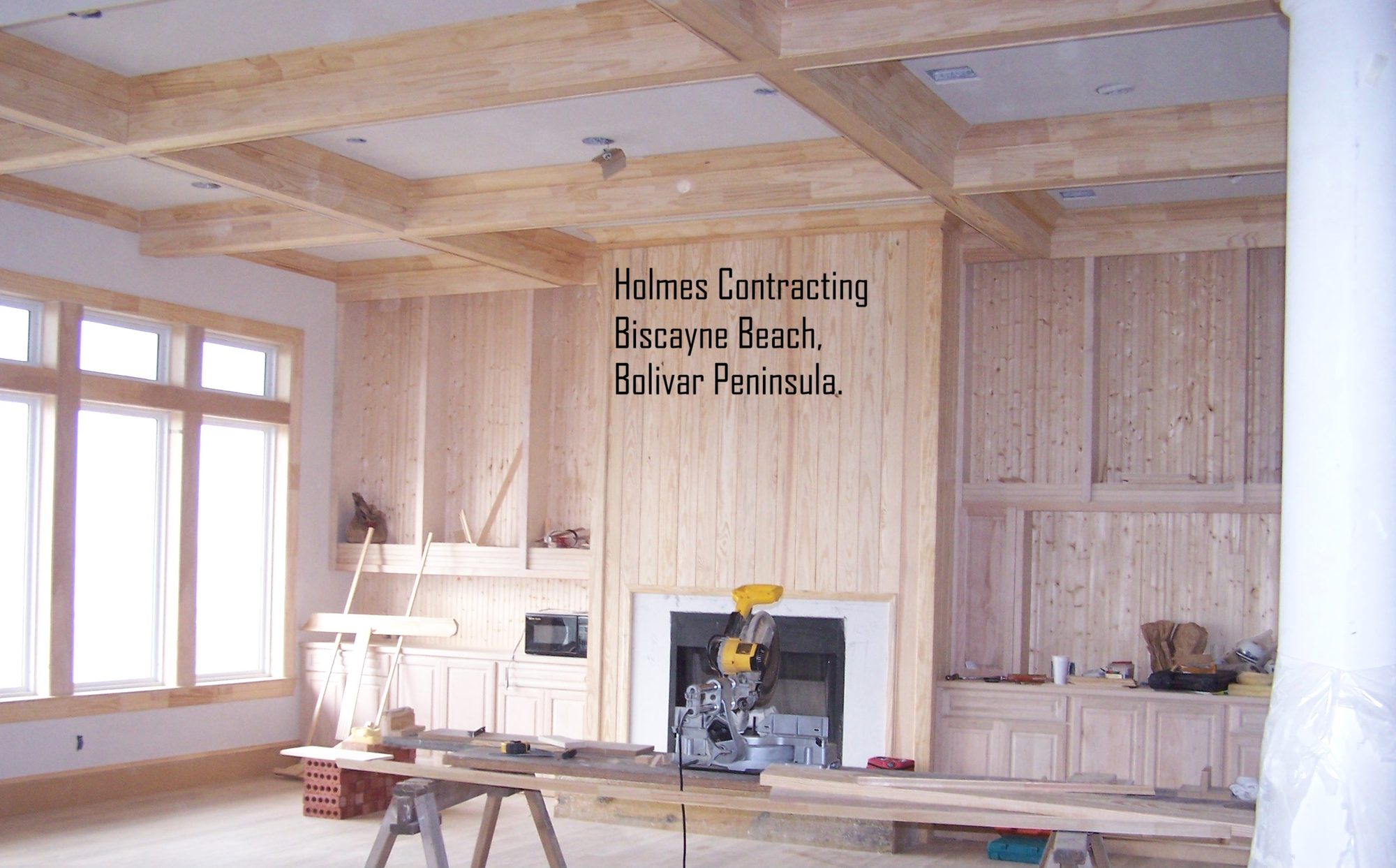 Coffered wood ceiling and paneled walls in a Biscayne Beach house under construction